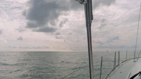View of oncoming ship on left side. View from cockpit of sailing yacht Stock Footage 93253332