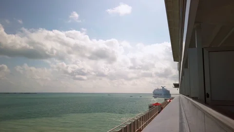 View of one cruise ship from another anchored in the Caribbean waters of Belize Stock Footage 108061542