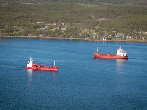 View of One Ship Stands Still, Other Moves. Two Vessels of Similar Size Are on Stock Footage 71555401
