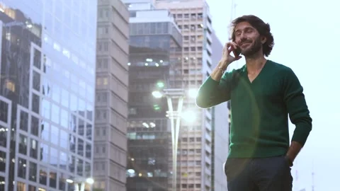 View of one young caucasian man with smartphone at night time Stock Footage 267705450