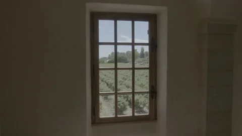 View Of An Open Agricultural Field Though A Window 4 - No LUT Version Stock Footage 222375339