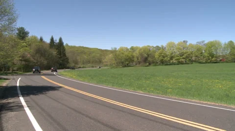 View of open field from road (3 of 4) Stock Footage 32025334