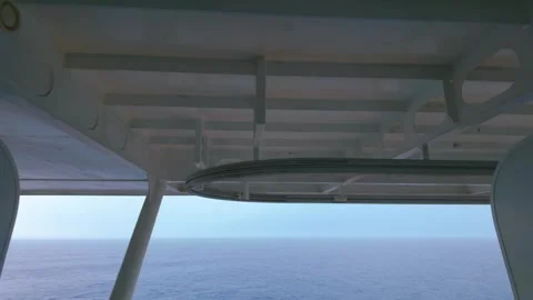 View of Open Ocean Horizon Framed by Cruise Ship Exterior Overhang Stock Footage 345927437