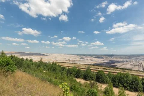 View at open pit mine Hambach with brown coal digging. Stock Photos