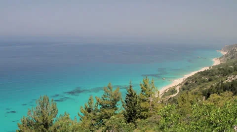 View to the open sea and sheer island coastline Stock Footage 25980602