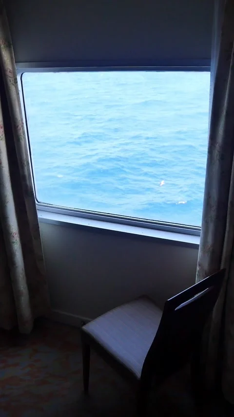 View of the open sea from the window of a VIP room on a ship. 스톡 동영상 319404934