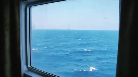 View of the open sea from the window of a VIP room on a ship. Stock Footage 319404943