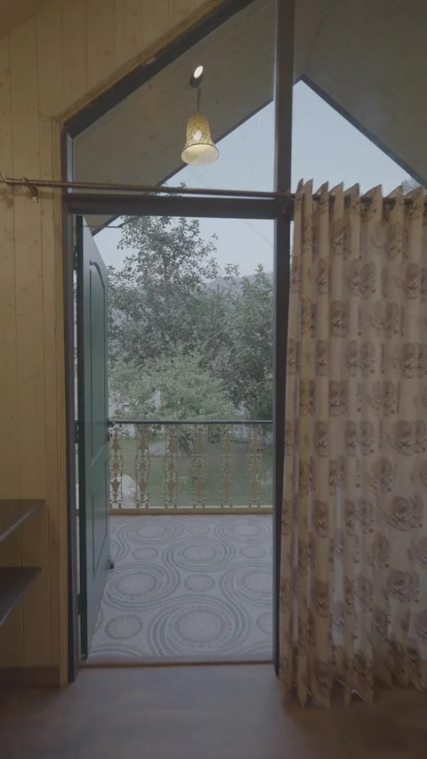 View of open sky, mountains from the balcony of a wooden hotel and cottage. Stock Footage 313030741