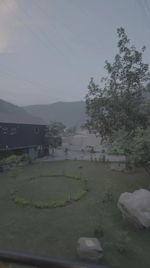 View of open sky, mountains from the balcony of a wooden hotel and cottage. Stock Footage 313031021