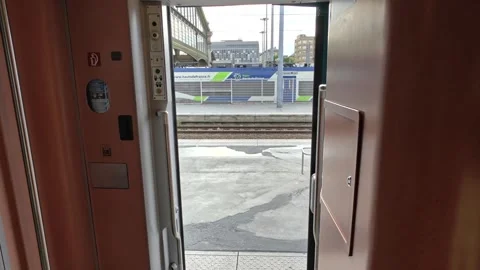 View From An Open Train Door Looking Out Onto A Station Platform Before Stock Footage 342775928