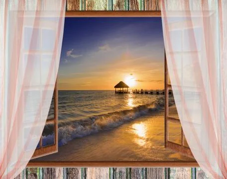 View from the open window of the caribbean sunset Фото