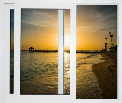 View from the open window of the caribbean sunset Foto stock