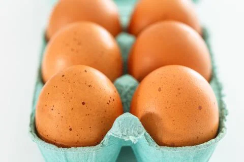 View of opened box of chicken eggs for market place Stock Photos