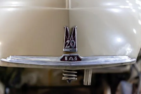 View on opened hood with label of the old Russian car of the executive class  Stock Photos