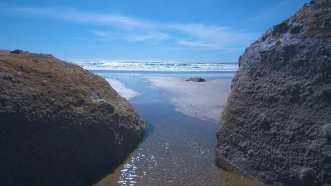 View of the Oregon Coast through Two Rocks Stock Footage 91050507