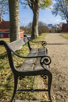 View of an ornate empty park bench Stock Photos
