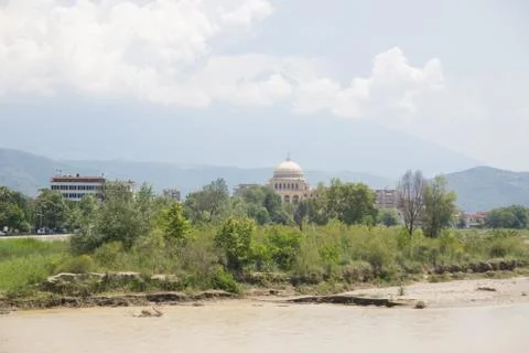 View of the Osum river flowing through the Albanian city of Berat. Stock Photos