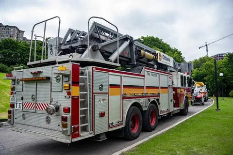View of Ottawa Fire Services ladder fire truck parked outdoors. Ottawa, Canada - Stock Photos