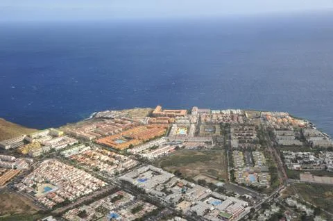 View out of a airplan to the surface of ocean and iland Tenerife Stock Photos