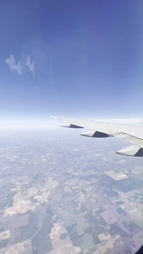 View Out of Airplane Window at altitude Stock Footage 273493253