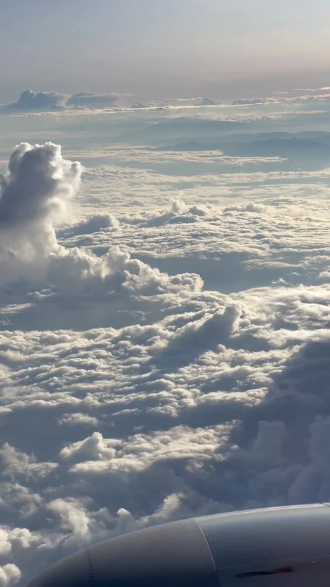 View out Airplane Window Cumulus Clouds. Stock Footage 250491516