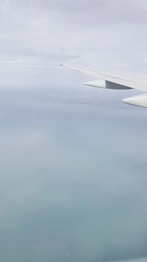 View Out of Airplane Window of the Gulf of Mexico Stock Footage 273493698