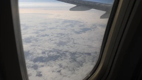 View out of airplane window in winter Stock Footage 102947470