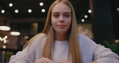 View out computer screen young woman attending online lessons interviewing Stock Footage 143736432