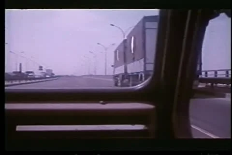 View out of moving car while passing an 18 wheeler Stock Footage 11346267