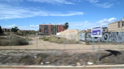 View out of a Renfe train window as the train is pulling into the Station. Stock Footage 42705288