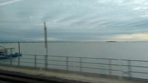 View out to river from Venice Train ride. Italy / Travel / Europe. Stock Footage 130984097