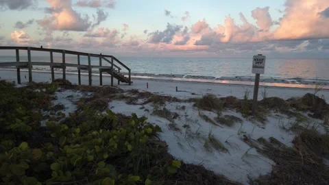View out to water Pass a grille beach , Florida Shoreline, Stock Footage 250121299