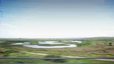 View from out the window on a countryside train 스톡 동영상 50035188