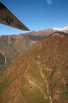 View out of the window on the flight from Lukla back to Kathmandu, the small  Stock Photos