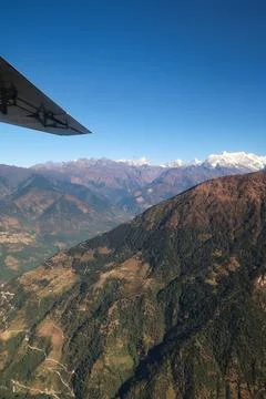 View out of the window on the flight from Lukla back to Kathmandu, a mounta.. Stock Photos