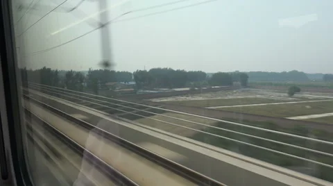 View out of the window of a high speed bullet train in China Stock-Footage 60416909