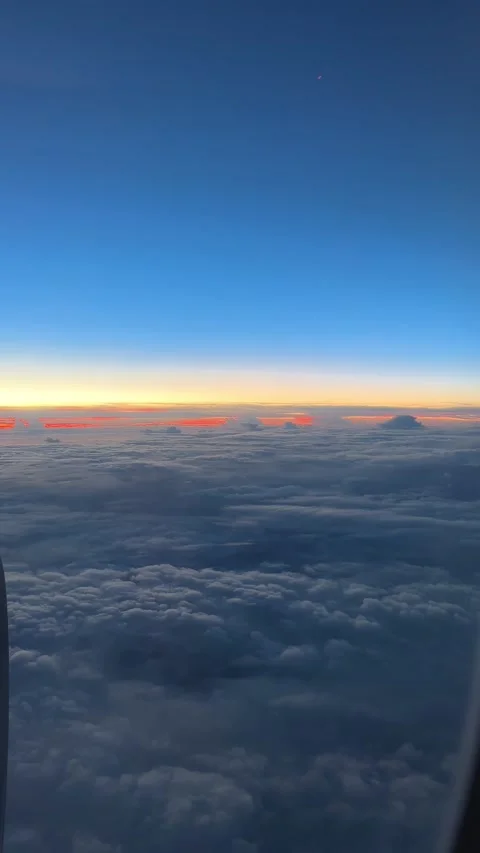 View outside airplane window on epic sunrise  Stock Footage 231743350