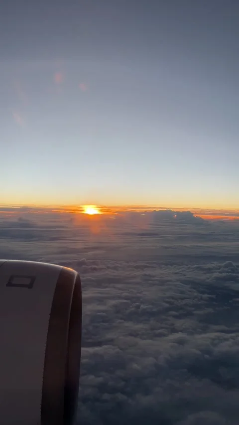 View outside airplane window on epic sunrise  Stock Footage 231758639