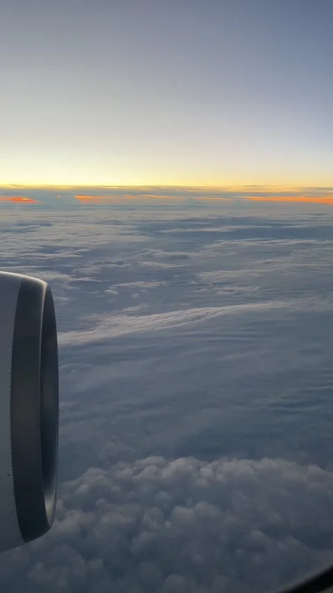 View outside airplane window on epic sunrise  Stock Footage 231758648