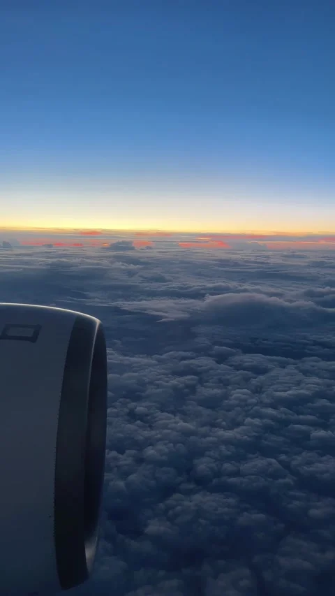 View outside airplane window on epic sunrise  Stock Footage 231758659