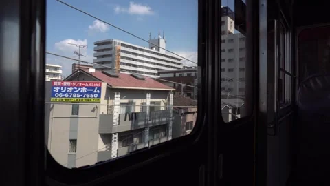 View Outside of Japanese Train Window - Apartment and Residential Buildings Stock Footage 264344603