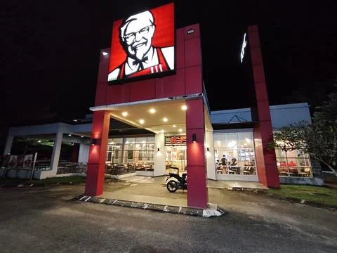 The view outside of KFC Restaurant serving halal fast food malaysian cuisine Stock Photos