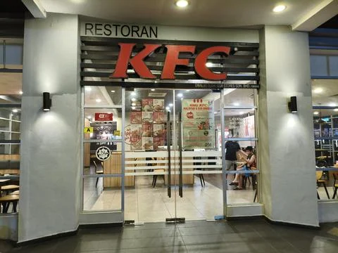 The view outside of KFC Restaurant serving halal fast food malaysian cuisine. Stock Photos