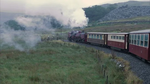 View from outside moving vintage stream train Stock-Footage 128360594