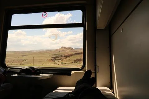 The view outside a window from the bed in the sleeping compartment, passenger Foto stock