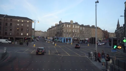 View Outside Window of Bus Driving Through Streets During Evening in Edinburgh Stock Footage 119139031
