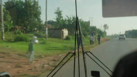 View Outside the Window of a Bus in Uganda Stock Footage 247679279