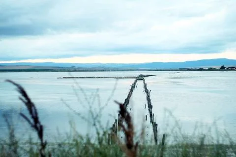 View over an artificial pond from which salt is extracted in Bulgarian city P Stock Photos