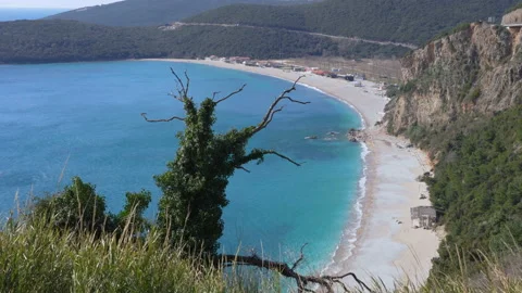 View over beach and lagoon Jaz towards beautiful green mountains on Montenegro Stock Footage 105376493