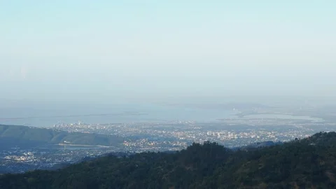 View over Blue Mountains towards Kingston, Jamaica Stock Footage 139004099